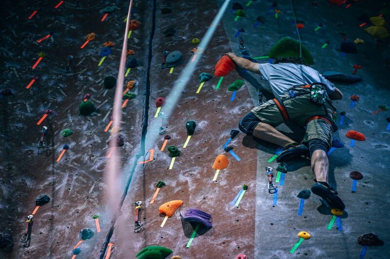Rock climber on an indoor climbing wall