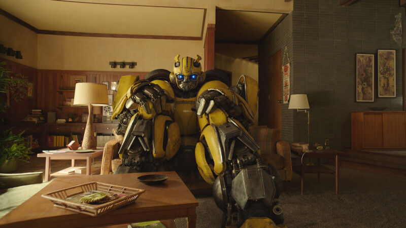 Bumblebee transformer sitting in a mid century modern lounge