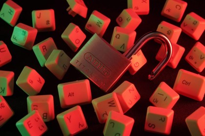 A group of computer keys with the lock on them on a black background