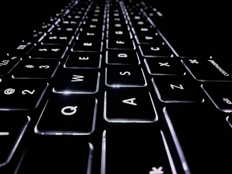 Close up of a back-lit laptop keyboard