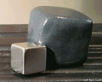 GIF Magnetic putty time lapse as it absorbs a rare earth magnet