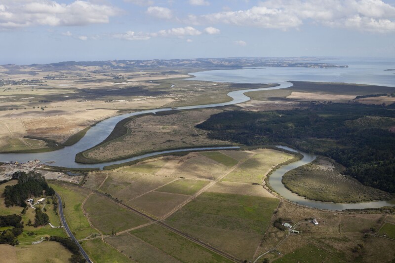 Aerial photo of river system running out to the sea
