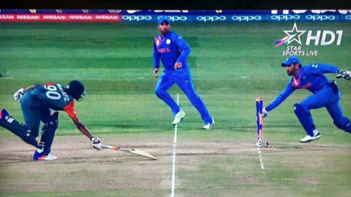 Bangladesh batsman just short of the crease as the Indian wicket keeper hits the stumps