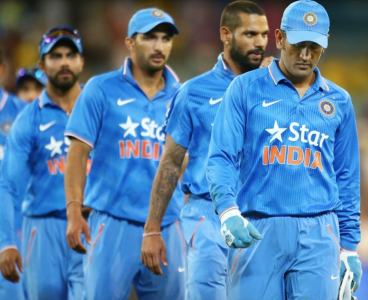 4 members of the Indian Cricket Team standing front-back