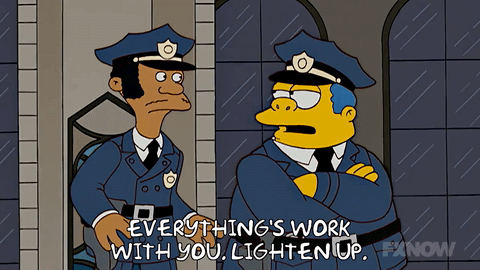 Gif of Simpson's cops Lou (left) and Chief Wiggum (right) - The Chief says to Lou as he reaches for an appetiser on the right Everything's work with you. Lighten up