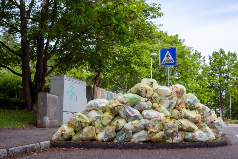 A pile of filled rubbish bag on the street