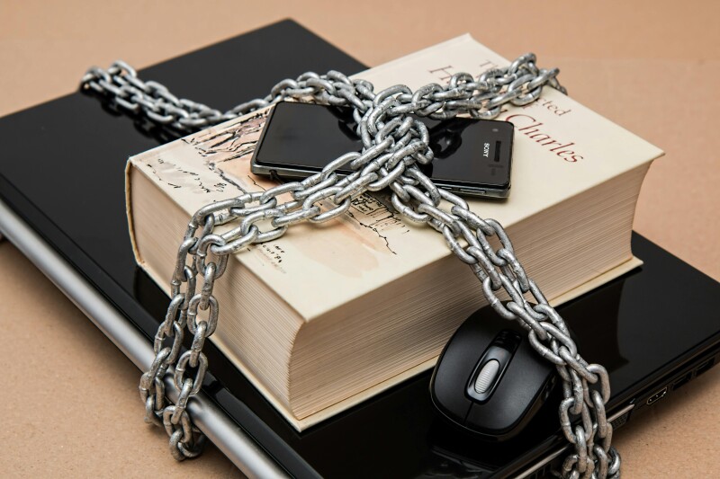 Book and devices physically locked down with a chain