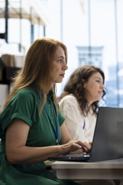 two doctors working on a computer